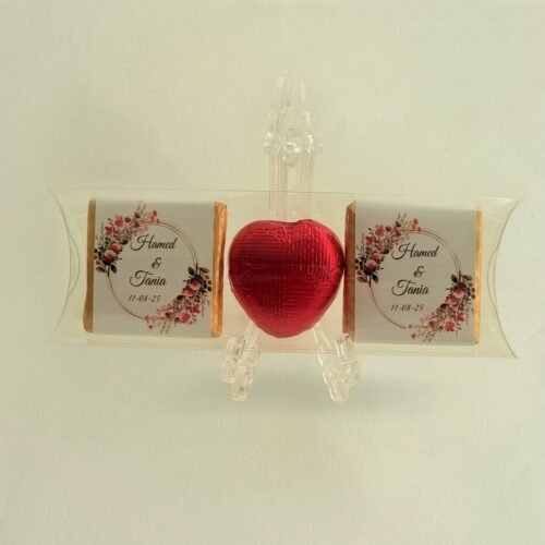 A romantic Heart Chocolate Favour Set by Favour Selebrations, featuring a heart-shaped chocolate and a themed love card.