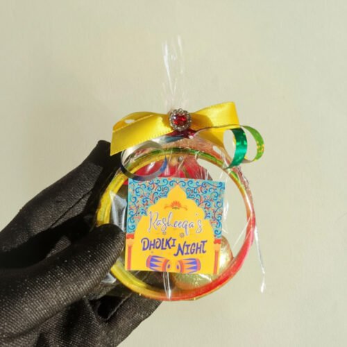 Elegantly packed Bangle Favours from Favour Selebrations for mehndi nights, featuring 4 bangles and a heart chocolate.